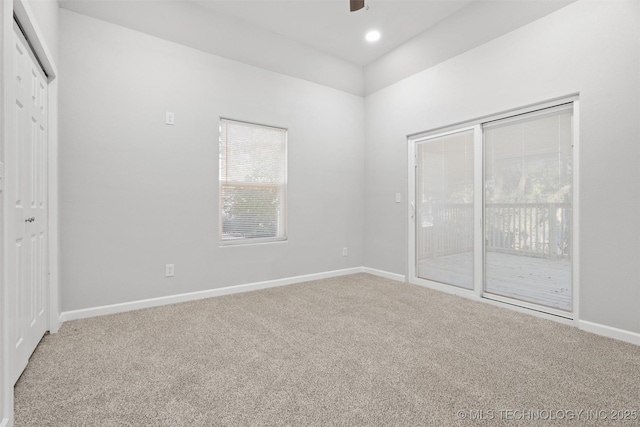 unfurnished bedroom featuring recessed lighting, a ceiling fan, carpet flooring, access to outside, and baseboards