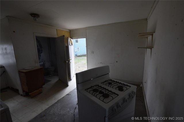 kitchen featuring white gas range