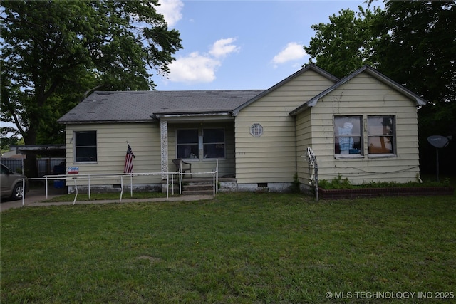 view of front facade featuring a carport, a front lawn, crawl space, and fence