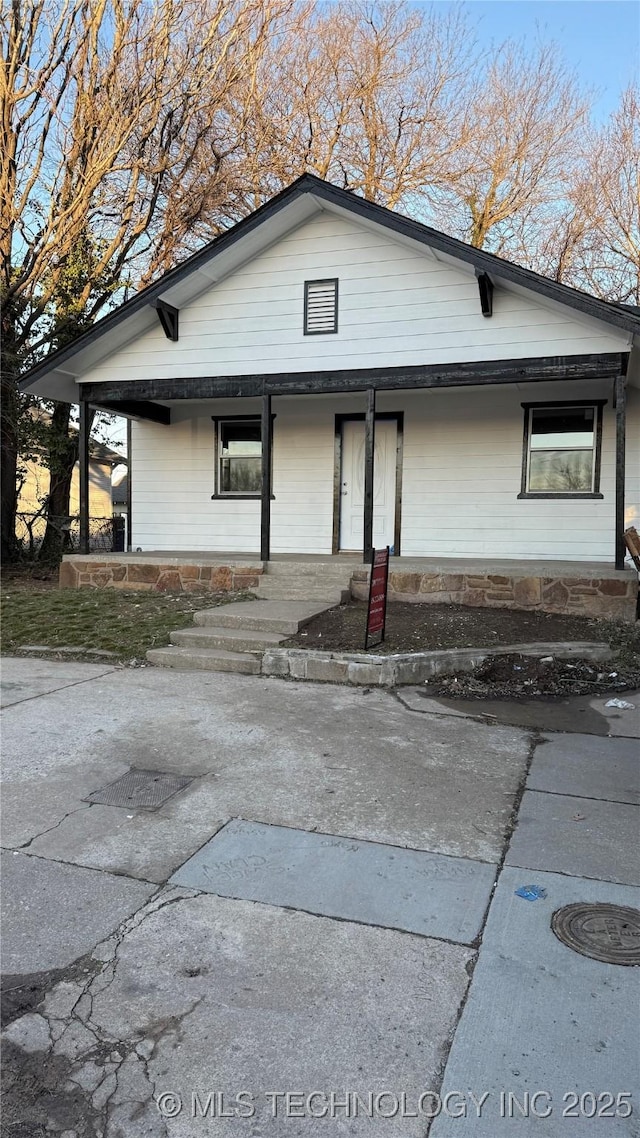 view of front of home featuring covered porch