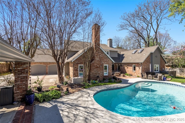 view of pool with a patio area, fence, and a fenced in pool