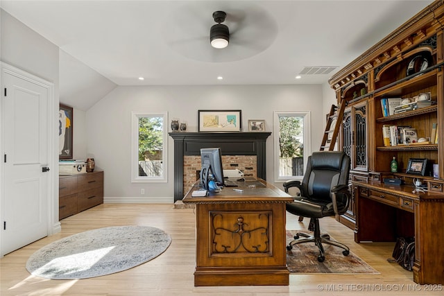 office featuring light wood finished floors, visible vents, baseboards, ceiling fan, and recessed lighting