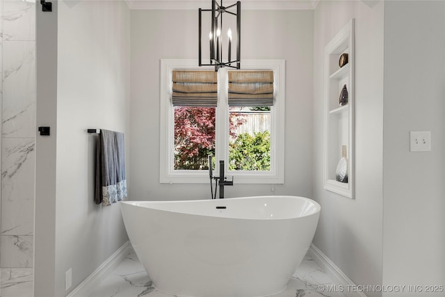 full bathroom with marble finish floor, a soaking tub, and baseboards