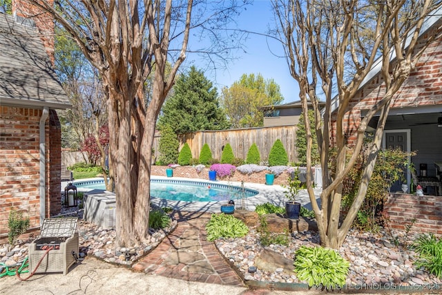 view of pool featuring fence and a fenced in pool