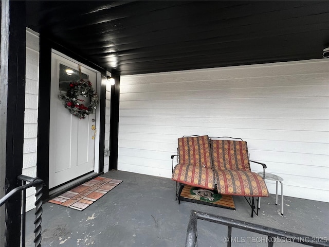 entrance to property with a porch