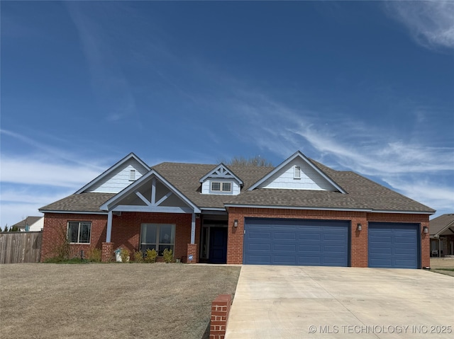 1825 E 45th Pl, Sand Springs, OK 74063 - view of front facade with a garage, fence, brick siding, driveway, and roof with shingles