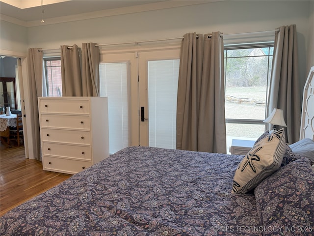 1825 E 45th Pl, Sand Springs, OK 74063 - bedroom featuring dark wood finished floors