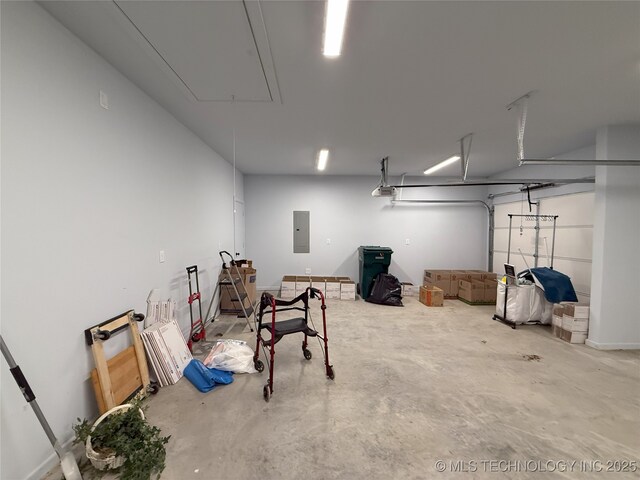 1825 E 45th Pl, Sand Springs, OK 74063 - garage with electric panel and a garage door opener