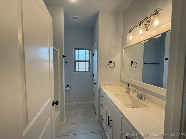 1825 E 45th Pl, Sand Springs, OK 74063 - bathroom featuring visible vents, baseboards, marble finish floor, and vanity