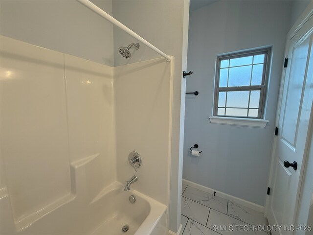 1825 E 45th Pl, Sand Springs, OK 74063 - bathroom with marble finish floor, baseboards, and tub / shower combination