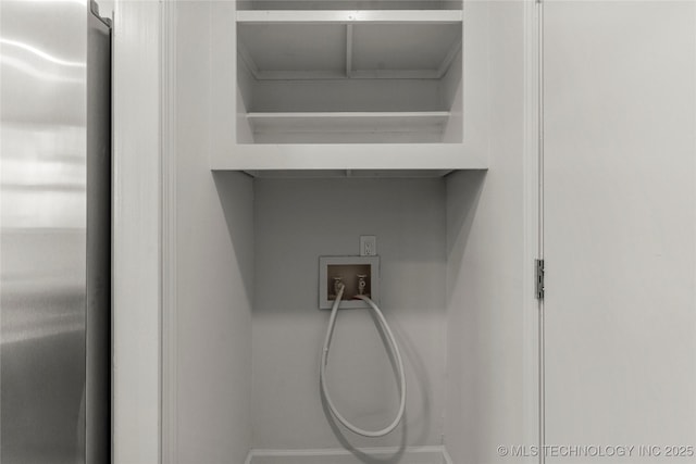 room details featuring freestanding refrigerator