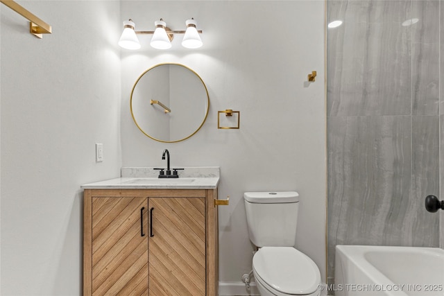 bathroom featuring a bathing tub, vanity, and toilet