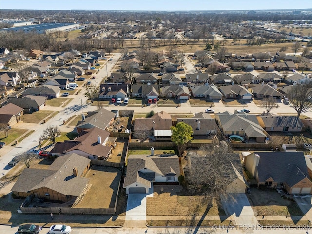 birds eye view of property with a residential view