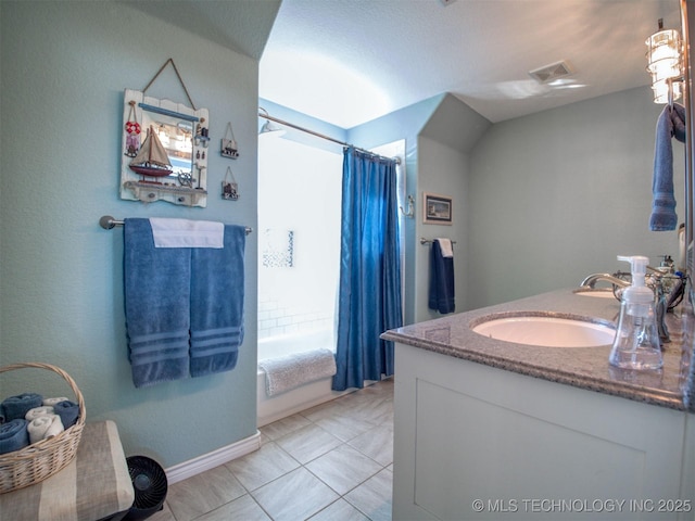 bathroom featuring double vanity, shower / tub combo, visible vents, and a sink