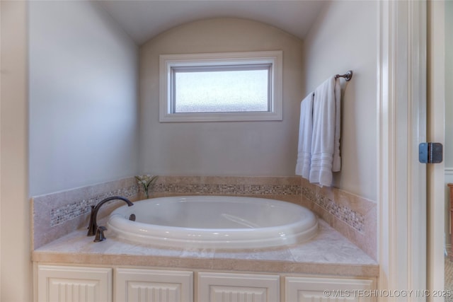 bathroom featuring a garden tub