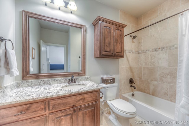 bathroom with toilet, shower / bathtub combination with curtain, and vanity