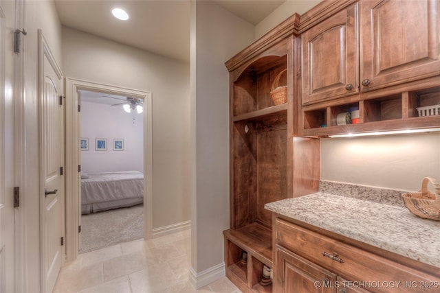 mudroom with light tile patterned floors, ceiling fan, baseboards, and recessed lighting