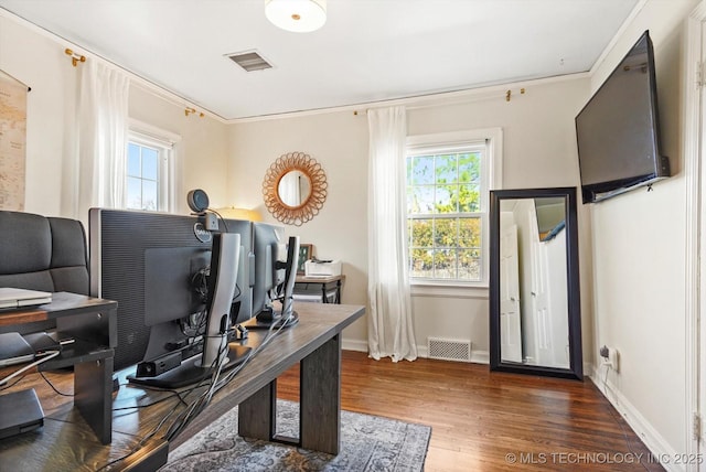 home office featuring baseboards, visible vents, and dark wood-type flooring