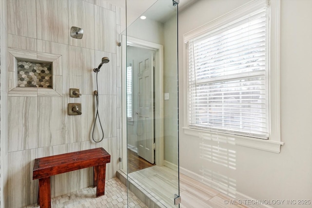 full bathroom featuring a walk in shower