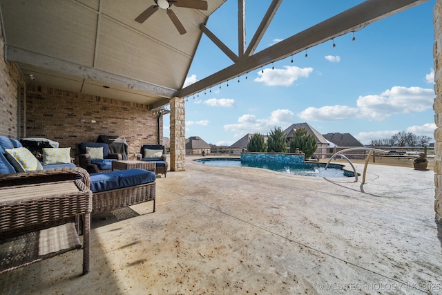 view of patio with outdoor lounge area, a ceiling fan, and an outdoor pool