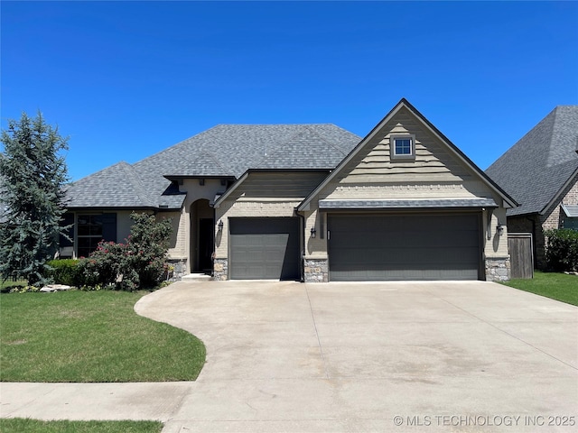 view of front of property with a garage, stone siding, and a front lawn