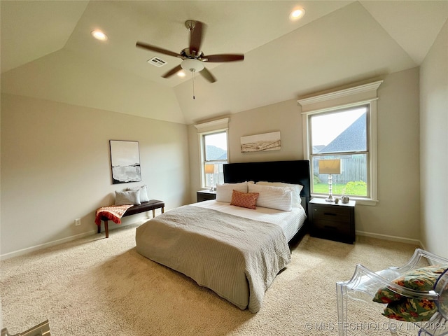 bedroom with lofted ceiling, recessed lighting, light colored carpet, visible vents, and baseboards