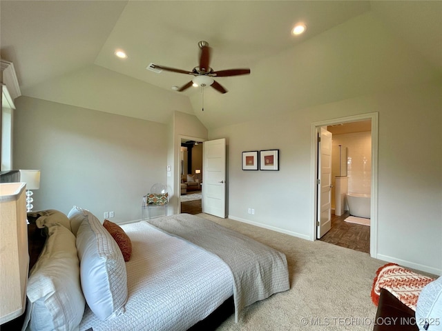 carpeted bedroom featuring lofted ceiling, baseboards, and recessed lighting