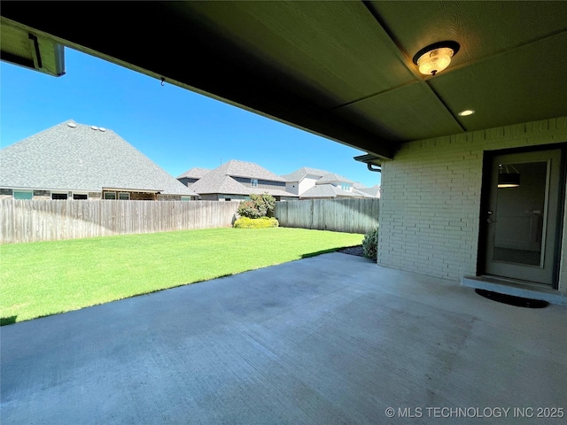 view of patio with a fenced backyard