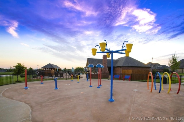 community jungle gym with fence