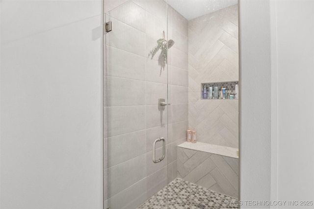 full bathroom with a stall shower