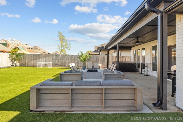 wooden deck featuring a patio, a fenced backyard, an outdoor living space, a ceiling fan, and a yard