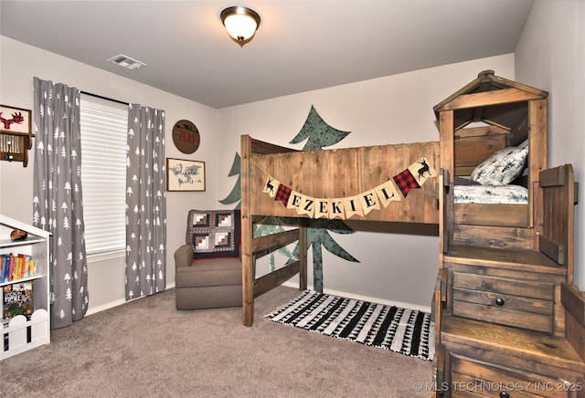 carpeted bedroom with visible vents