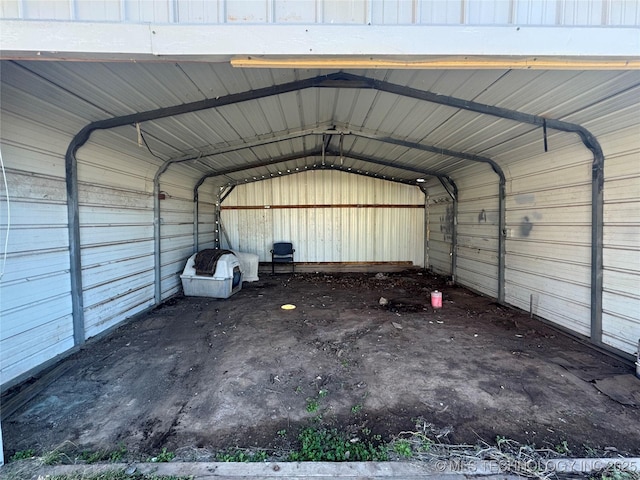 view of vehicle parking featuring a carport