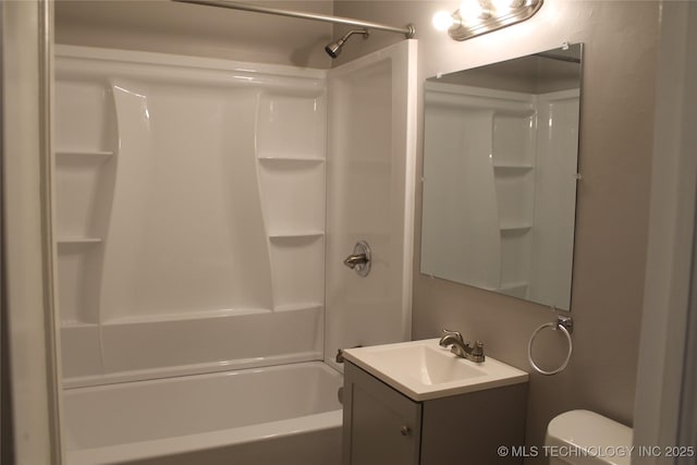 bathroom featuring tub / shower combination, toilet, and vanity