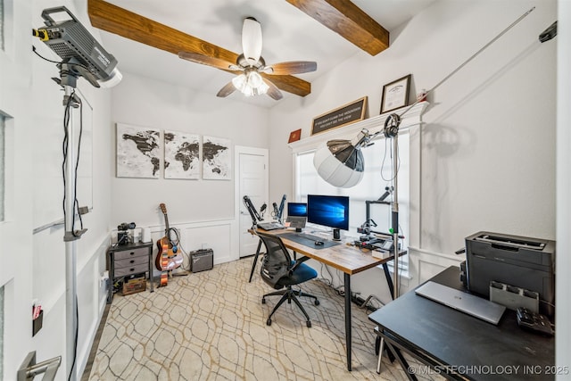 office featuring ceiling fan and beam ceiling