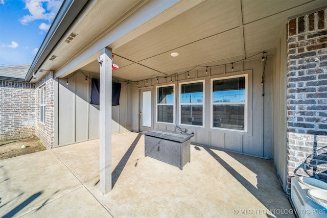 view of patio / terrace with visible vents