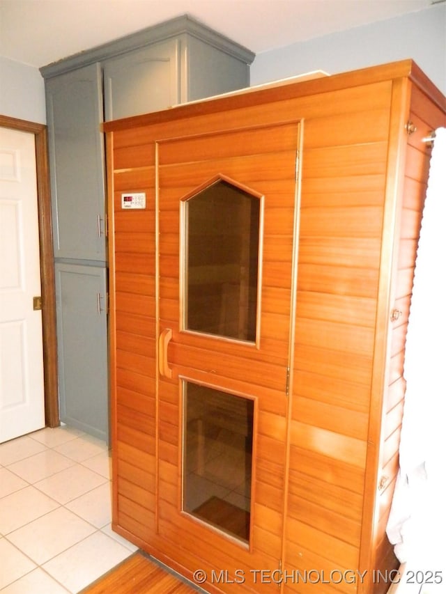 view of sauna / steam room with tile patterned flooring
