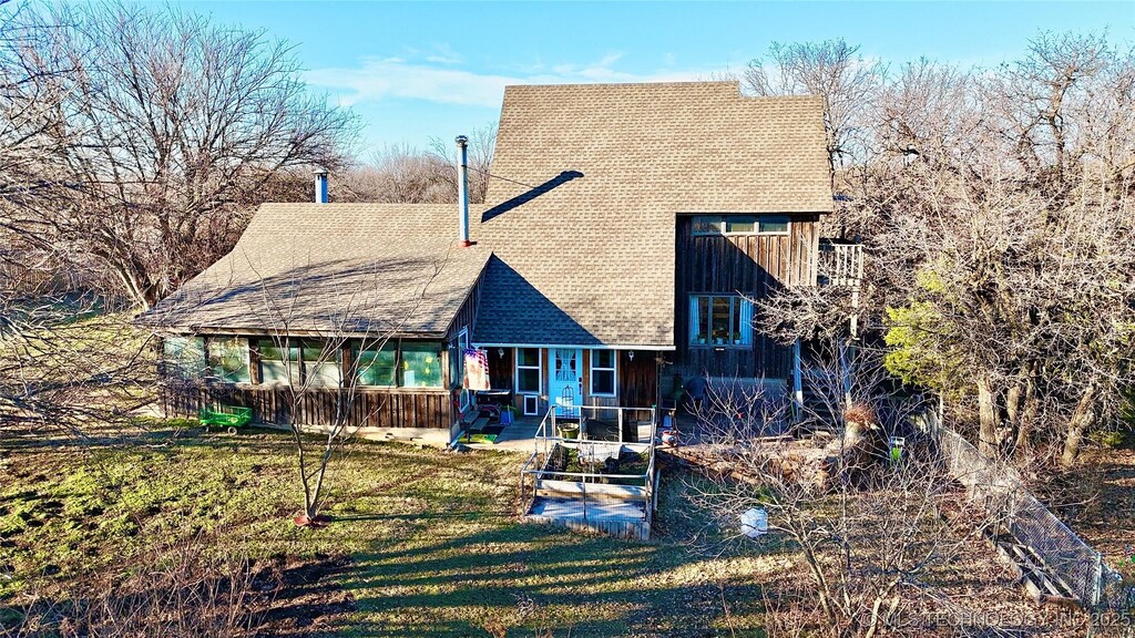 894 Chickasaw Rd, Sand Springs, OK 74063 - rear view of house featuring a patio area and a lawn