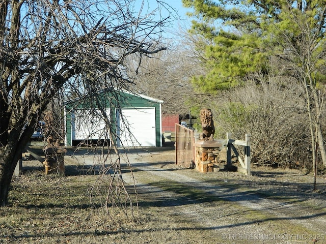 view of side of home featuring an outdoor structure