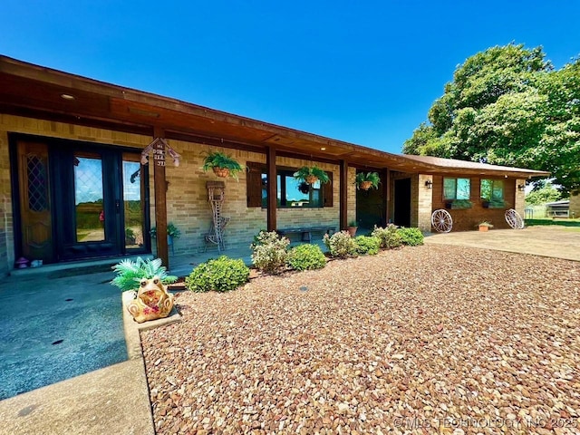 view of front of property with brick siding