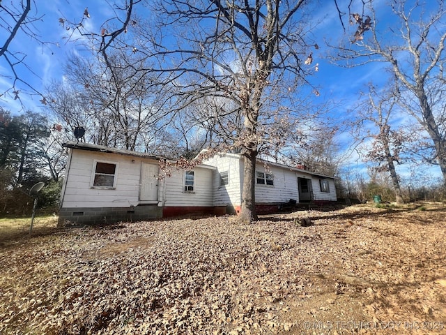 view of front of house with crawl space