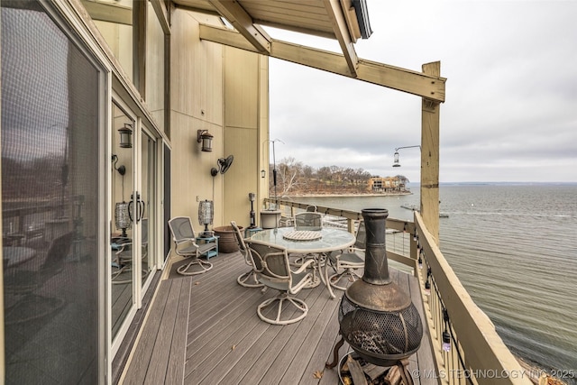 29898 S 566th Rd Unit 411, Afton, OK 74331 - balcony featuring a water view and outdoor dining space