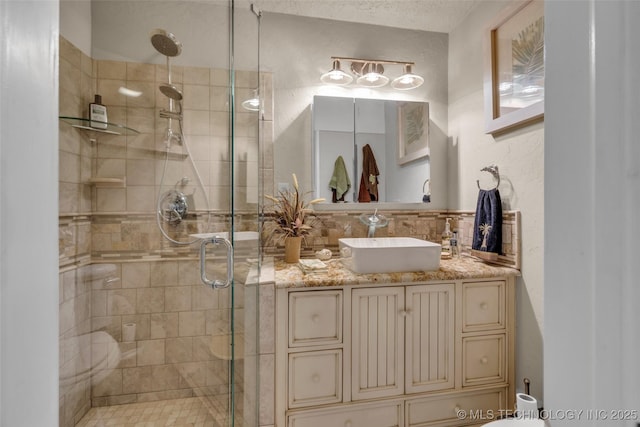 29898 S 566th Rd Unit 411, Afton, OK 74331 - full bath featuring a shower stall, vanity, and decorative backsplash
