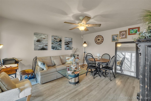 29898 S 566th Rd Unit 411, Afton, OK 74331 - living area with a ceiling fan and wood finished floors