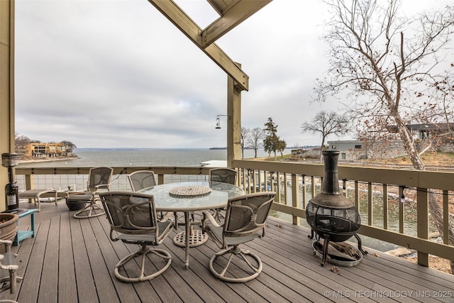 29898 S 566th Rd Unit 411, Afton, OK 74331 - wooden terrace with a water view and outdoor dining area