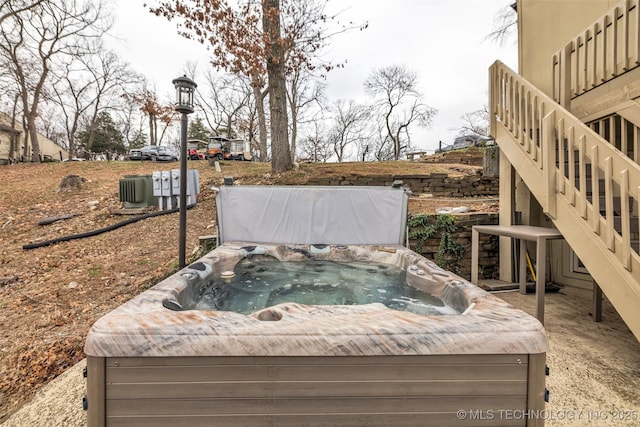 29898 S 566th Rd Unit 411, Afton, OK 74331 - exterior view of a jacuzzi and stairway