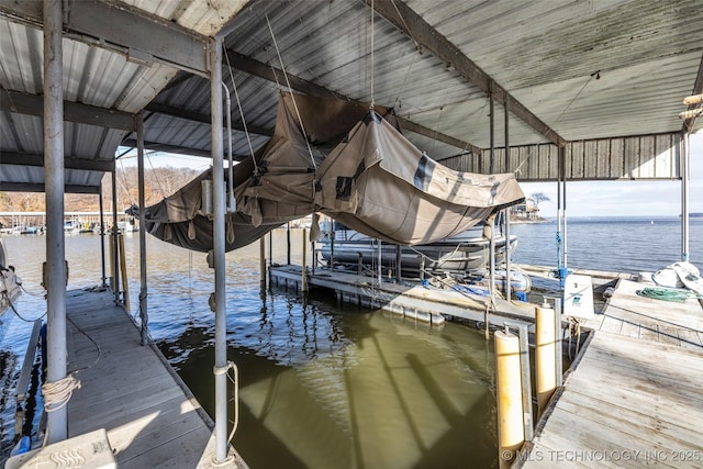 29898 S 566th Rd Unit 411, Afton, OK 74331 - dock featuring boat lift and a water view