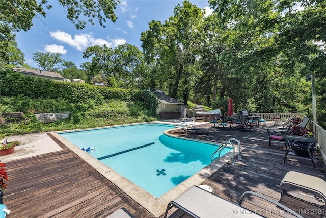 29898 S 566th Rd Unit 411, Afton, OK 74331 - view of swimming pool with a deck and outdoor dining space
