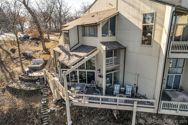 29898 S 566th Rd Unit 411, Afton, OK 74331 - rear view of house featuring a shingled roof