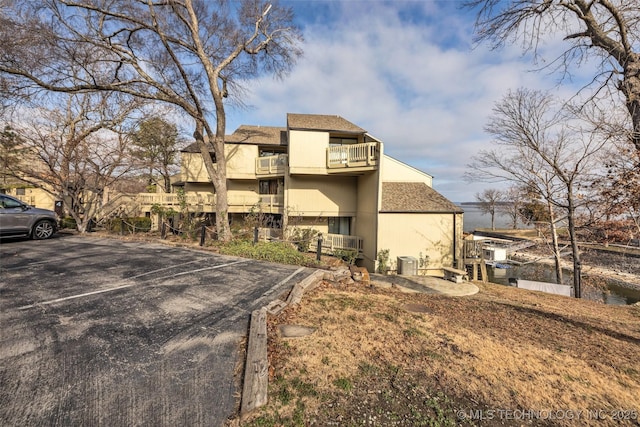 29898 S 566th Rd Unit 411, Afton, OK 74331 - view of property featuring uncovered parking